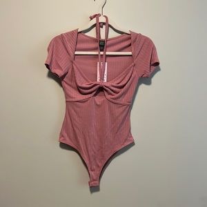 Pink body suit